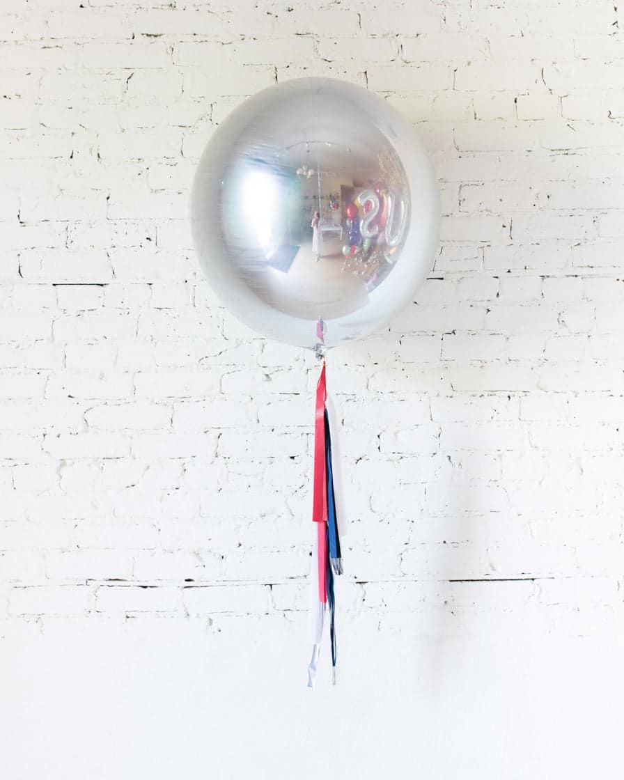 21in Silver Foil Orb Balloon and Red, White & Blue Half-Tassel | Rental